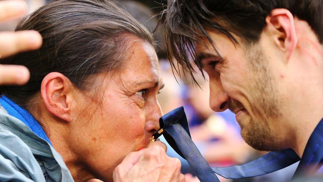 Easton Wood celebrating his premiership win with his mum. Picture: Darrian Traynor/Getty