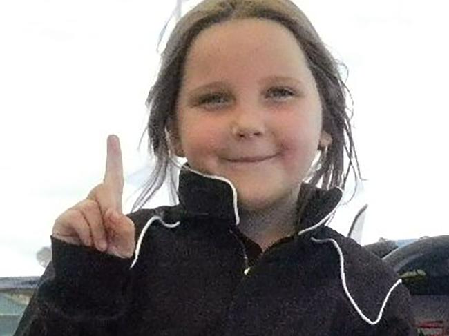 This handout photo from Junior Dragster Australia taken on October 14, 2017 and received on November 13, 2017 shows eight-year-old Anita Board next to her junior dragster racing car. The young girl died after crashing her junior dragster during a test run in Western Australia, police said on November 13 after she hit a cement barrier at the end of the run in the city of Perth, they said. / AFP PHOTO / Junior Dragster Australia / MIKE SPRLYAN / RESTRICTED TO EDITORIAL USE - MANDATORY CREDIT 
