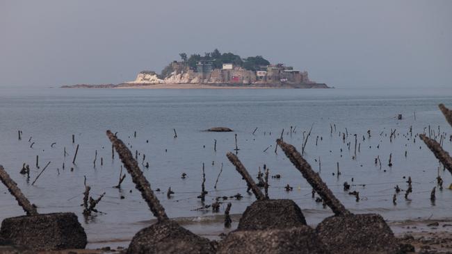 Taiwan's remote Shihyu islet, as seen from behind the the anti-landing spikes on Taiwan’s frontline island of Little Kinmen. Picture: by Sam Yeh/AFP