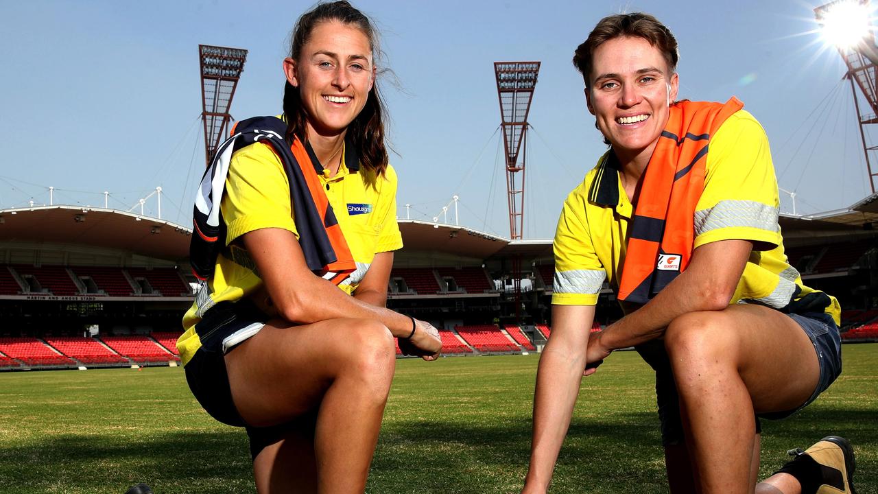 Giants Stadium groundstaff Aimee Schmidt and Pepa Randall will be playing for the GWS AFLW team this season. Picture: Phil Hillyard