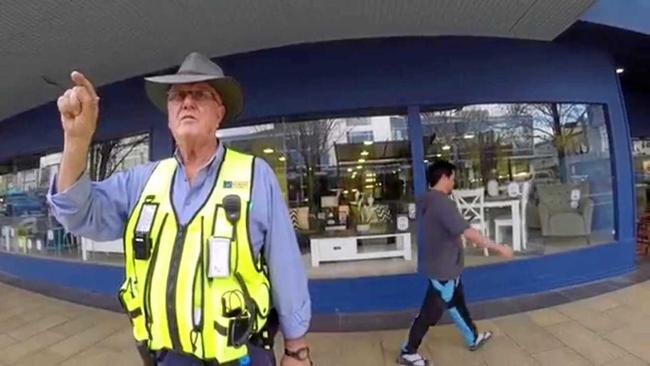 A Tweed Shire parking inspector berates a rollerblader for skating on the footpath. Photo Contributed. Picture: Contributed