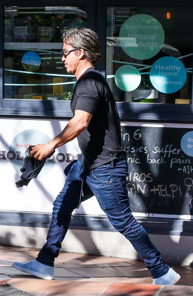 John Ibrahim leaving a Sydney Cafe on Wednesday. Picture: MATRIX