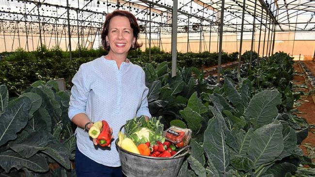 FOOD BOWL: Kate Rehbein with some of the produce she grew in the lead-up to Bundy Flavours. Picture: Mike Knott BUN030719REH10