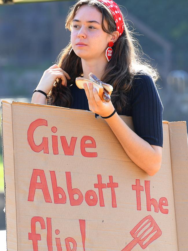 School striker Vivienne Paduch, 15, wearing Stop Adani earrings at Queenscliff SLSC on Election Day in Sydney.