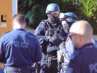 Heavily armed tactical police were involved in this morning's police operation at Sapphire Beach. Picture: Frank Redward