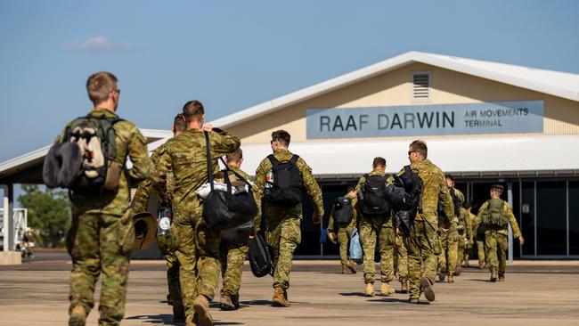 Australian Army soldiers disembark a Royal Australian Air Force KC-30A Multi-Role Tanker at RAAF base Darwin, following their deployment to the UK on Operation Kudu. Picture: Annie Richardson