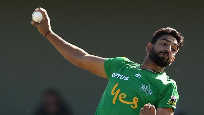 Haris Rauf charges in during his five-wicket haul against the Hurricanes.