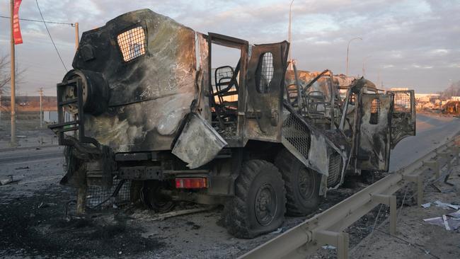 A charred military vehicle is seen on a road, as Russia's invasion of Ukraine continues, near the town of Bucha in the Kyiv region. Picture: Reuters/Maksim Levin