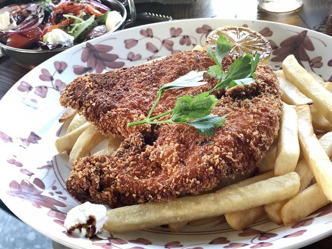 Embargoed for The Daily Telegraph. The new Five Dock Bowling Club has just opened this week. Restaurant Skinny Tony's has a Chicken Schnitzel: $28.90, Fried chicken breast crumbed, w. parmesan cheese & parsley, Add Fries $6.90, Add Side Salad $8.90,  . Picture Rohan Kelly