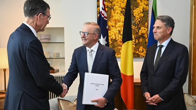 Sir Angus Houston delivered the Defence Strategic Review 2023 to Prime Minister Anthony Albanese and Deputy PM and Minister of Defence Richard Marles at Parliament House on February 14. Picture: Martin Ollman/Getty Images