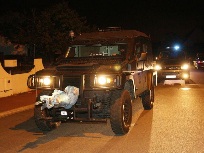 A French special forces RAID vehicle leaves after an assault in Magnanville, 45 kms west of Paris. Picture: AFP/ MATTHIEU ALEXANDRE