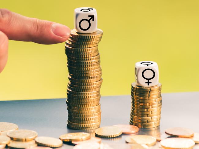 Symbol for unequal payment. Gender symbols on different high stacks of coins. Gender pay gap. Gender inequality. Pay inequality. Picture: iStock