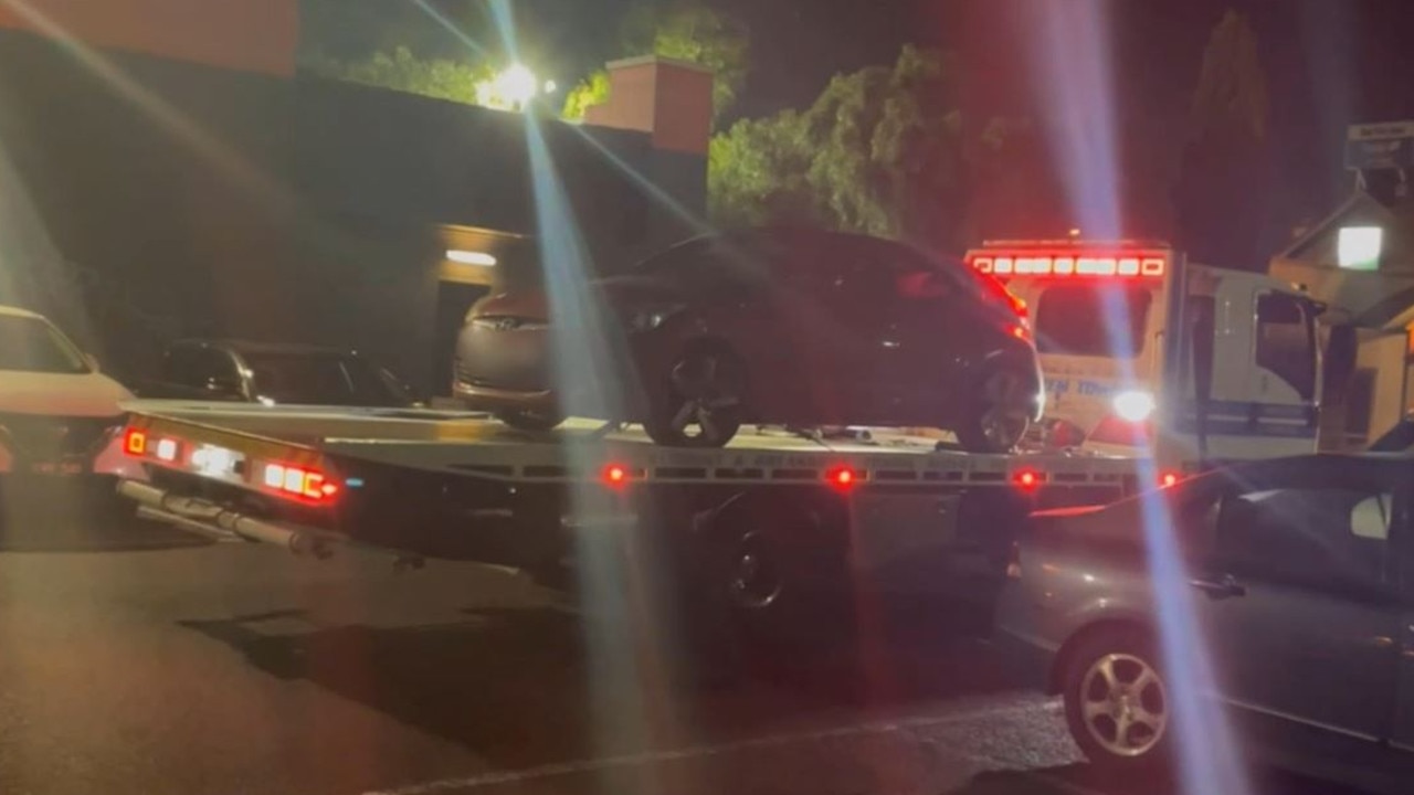 A car is seized in a police sting called Operation Ghost targeting stolen vehicles in Melbourne’s west. Picture: Victoria Police