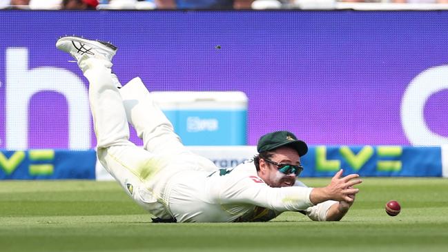 Travis Head makes a meal of the difficult outfield catch. Picture: Getty