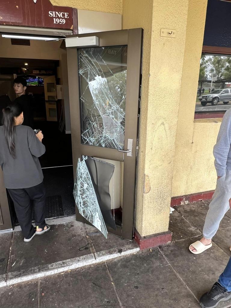 The door was badly damaged after repeat attempts by rioters. Picture: Supplied