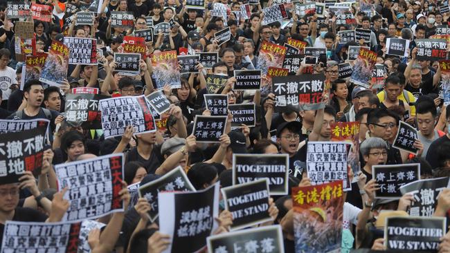 Young and old protesters in Hong Kong demonstrate against the proposed extradition law that set off the crisis in the former British territory handed back to China as a special zone 23 years ago. Some of the young may be about to learn different ways. Picture: AFP