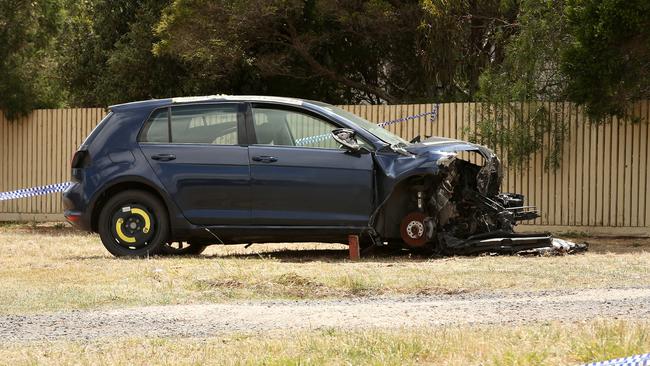 A smashed car at the scene. Picture: Alison Wynd