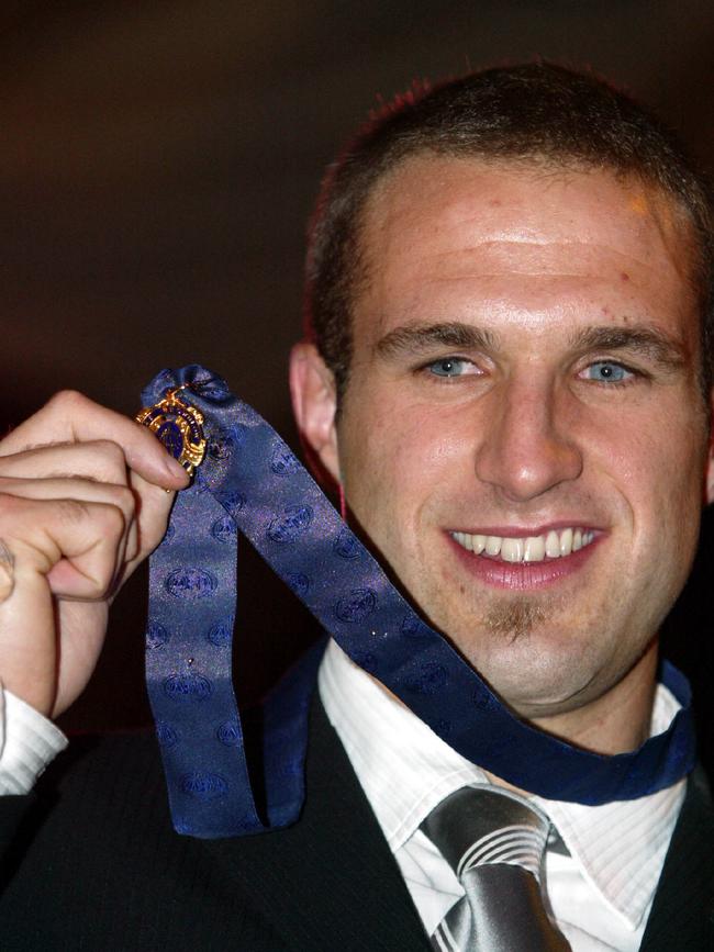 Judd with his first Brownlow Medal in 2004.