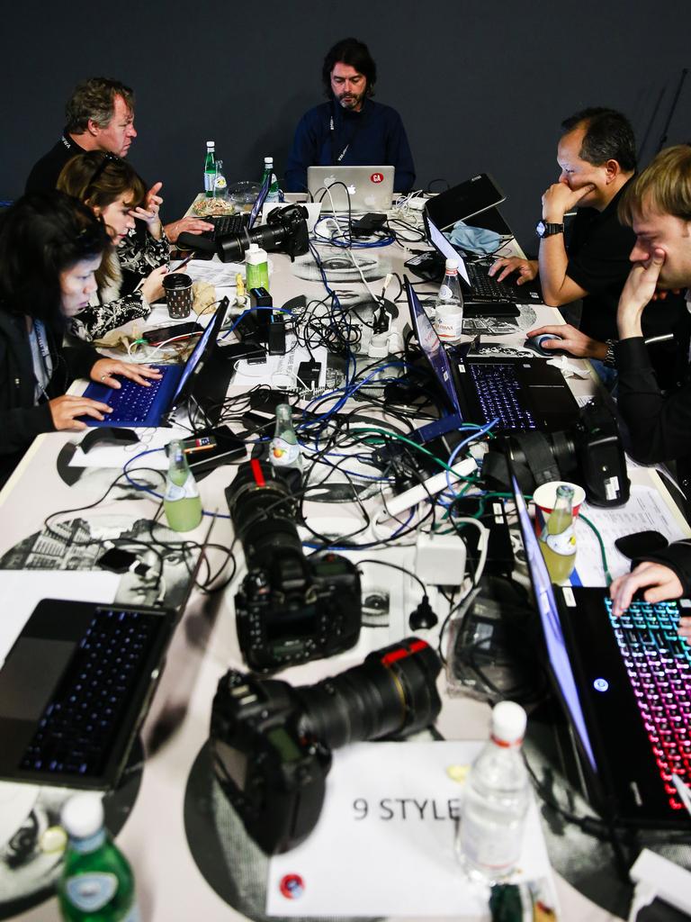 Behind the scenes at Fashion Week at Carriageworks. Photographers sending pictures. Picture: Dylan Robinson