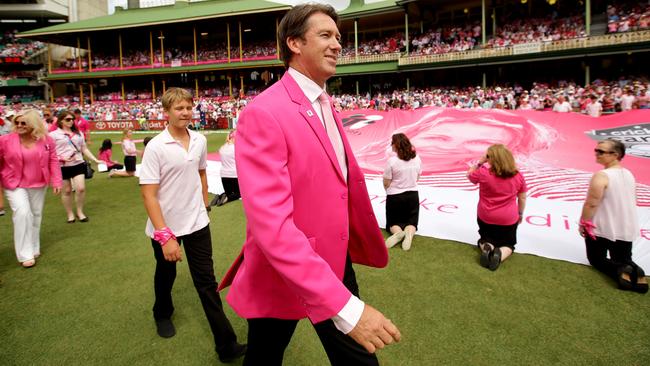 Glenn McGrath walks in front of the Members stand with his kids and Tracy Bevan during Jane McGrath Pink Test Day ceremonies before play in the 5th Ashes Cricket Test match between Australia and England at the SCG .Picture Gregg Porteous