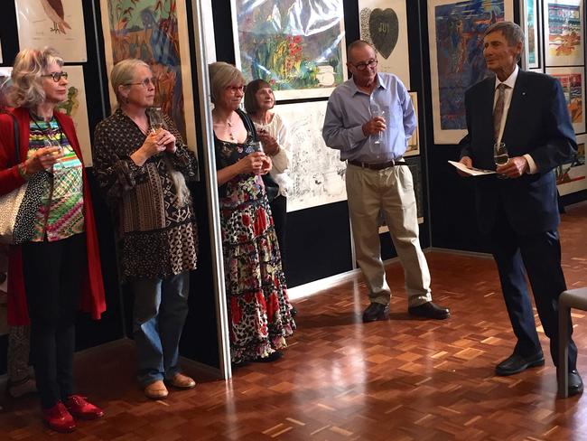 John Bannon at his final public appearance, on Friday, to open an exhibition for his father’s artworks. His first wife, former Supreme  Court judge Robyn Layton (far left), and widow Angela Bannon (third from left) were present.