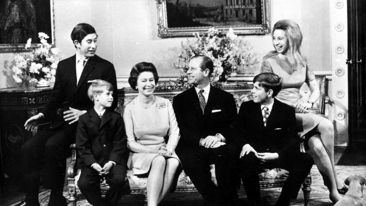 Queen Elizabeth II with Prince Philip, centre, surrounded by children Prince Charles, left, Prince Edward, Prince Andrew (next to Prince Philip) and Princess Anne, far right, for the Queen’s silver wedding anniversary in 1972. Picture: Supplied