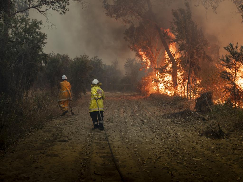 Firefighters battle bushfires at Yanchep in Western Australia. Picture: Evan Collis