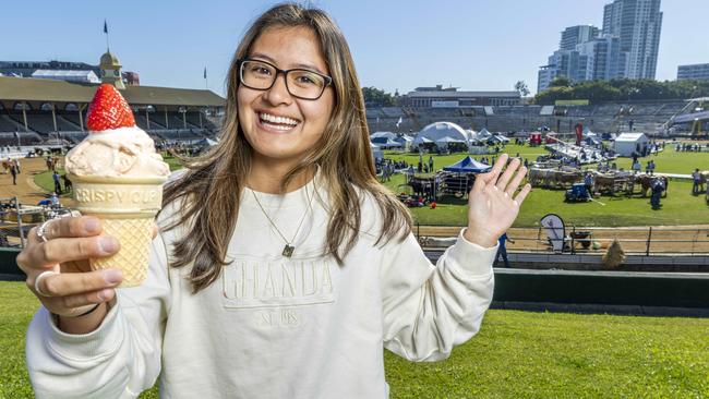 Samantha Loy from Fitzgibbon with the iconic Ekka strawberry Sunday. Picture: Richard Walker