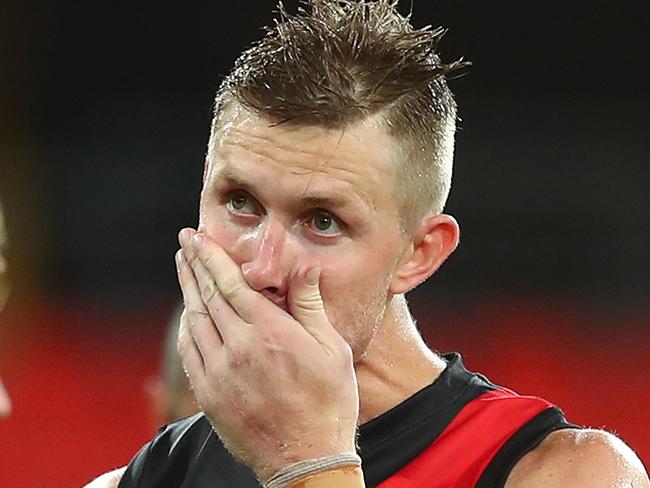 GOLD COAST, AUSTRALIA - AUGUST 07: Shaun McKernan of the Bombers looks dejected after losing the round 10 AFL match between the Essendon Bombers and the Greater Western Sydney Giants at Metricon Stadium on August 07, 2020 in Gold Coast, Australia. (Photo by Chris Hyde/Getty Images)