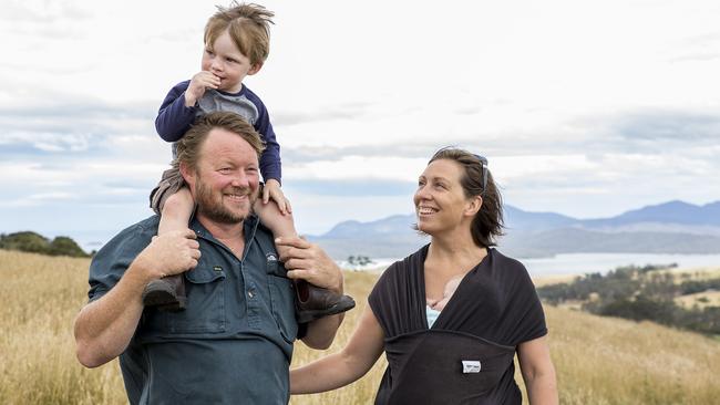 Iain and Kate Field with their kids Hamish and Zoe at their goat dairy farm at Bream Creek in Tasmania. Picture: Kim Storey