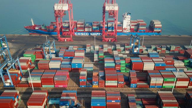 Shipping containers stacked at a port in Lianyungang, in China's eastern Jiangsu province. China’s leaders cite commodity markets as a cause of high producer price inflation. Picture: AFP