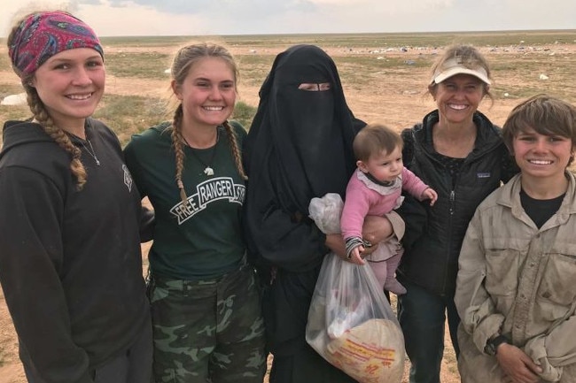 ISIS bride Zehra Duman with aid workers from the Free Burma Rangers in Syria at a Syrian refugee camp. Picture: Supplied 