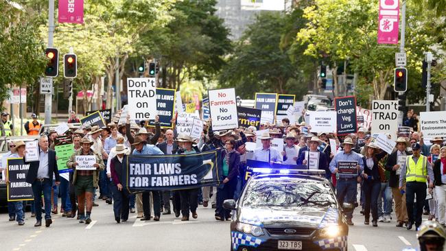 Police escort the crowd through Brisbane streets. Pic: Liam Kidston