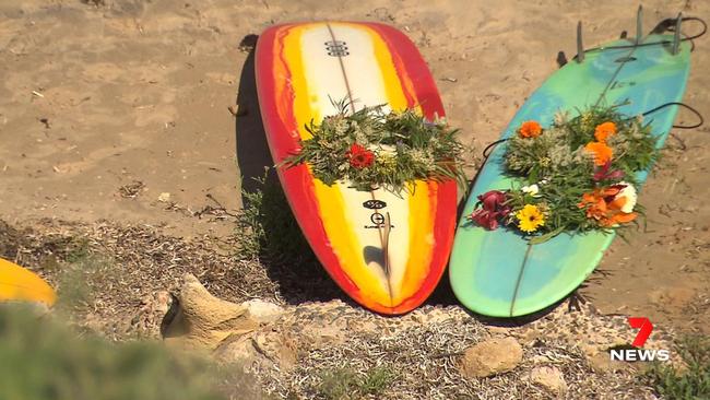 Wreaths atop surfboards. Picture: 7NEWS