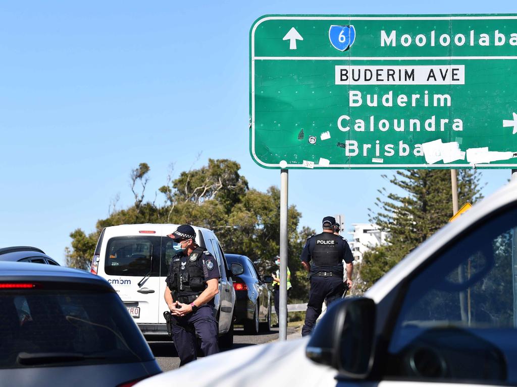 Police conduct travel checks during lockdown at Alexandra Headland. Picture: Patrick Woods.