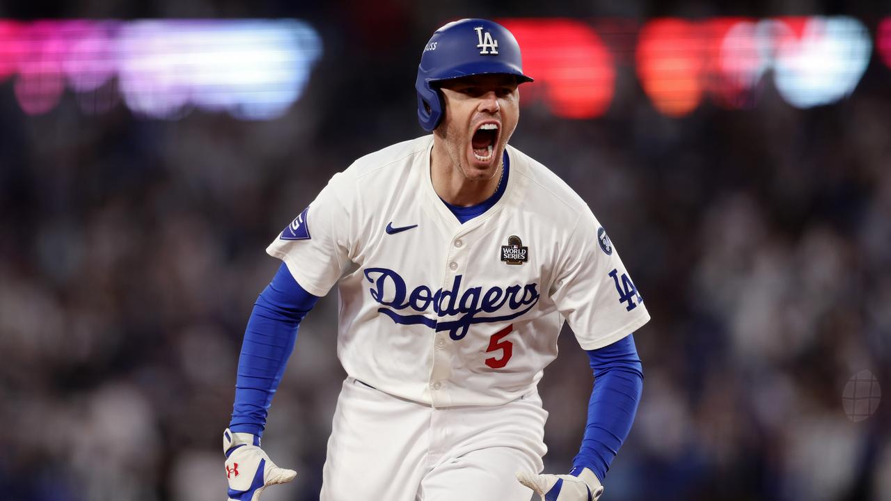 LOS ANGELES, CALIFORNIA - OCTOBER 25: Freddie Freeman #5 of the Los Angeles Dodgers celebrates after hitting a walk-off grand slam during the tenth inning against the New York Yankees during Game One of the 2024 World Series at Dodger Stadium on October 25, 2024 in Los Angeles, California. (Photo by Harry How/Getty Images)