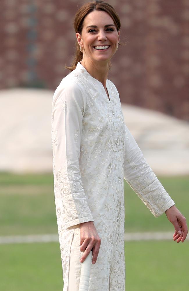 Kate laughed along with locals while playing cricket at the National Cricket Academy in Lahore. Picture: Getty Images.