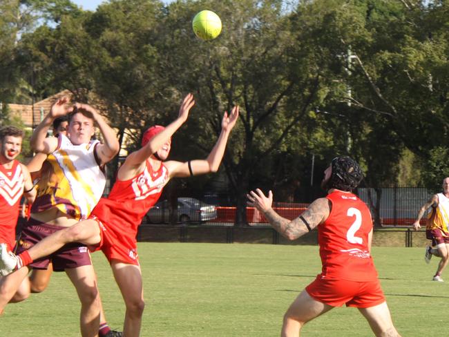 HEAD GEAR: Tow of the Lismore Swans players sported helmets as head protection at the match with th Casino Liona on Saturday April 24, 2021. Helmets may become more popular as the AFL has updated its concussion guidelines, Photo: Alison Paterson