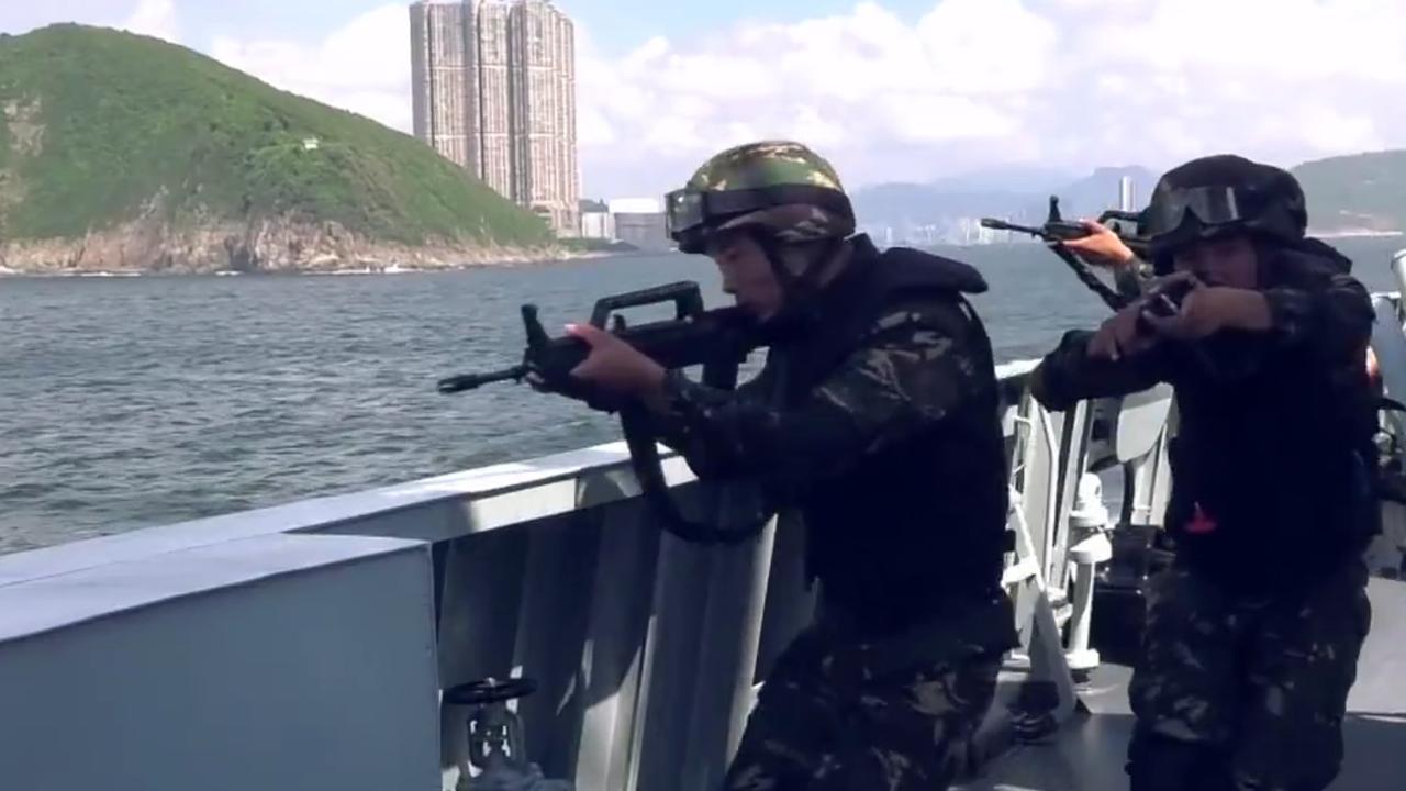 A slick propaganda video released by the People’s Liberation Army in 2019 shows Chinese soldiers on a boat during a drill in Hong Kong waters. Picture: AFP