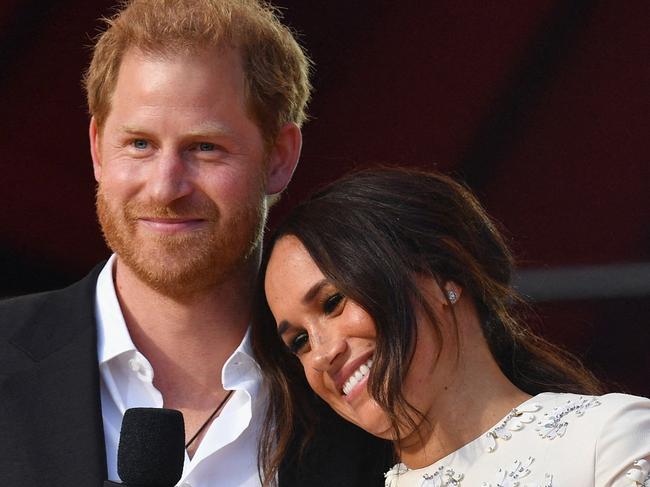 (FILES) Britain's Prince Harry and Meghan Markle speak during the 2021 Global Citizen Live festival at the Great Lawn, Central Park on September 25, 2021 in New York City. A multi-million-dollar deal between a media group run by Britain's Prince Harry and his wife Meghan Markle, and streaming giant Spotify is to end, a report said June 15, 2023. (Photo by Angela Weiss / AFP)