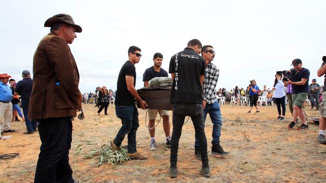 The remains of more than 100 bodies, including Mungo Man, are moved in 2017 to storage at Mungo National Park. Picture: Aaron Francis