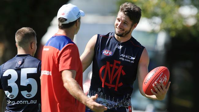 Paul Roos chats to Jesse Hogan at Melbourne training. Picture: Wayne Ludbey