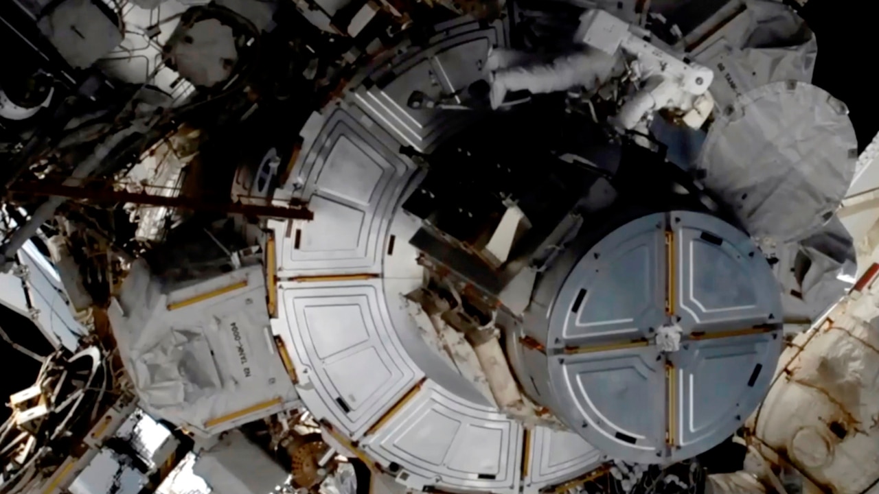 NASA astronauts conduct space walk to replace space station batteries