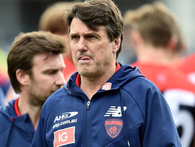 Demons coach Paul Roos is seen at quarter-time during the Round 23 AFL match between the Geelong Cats and the Melbourne Demons at Simonds Stadium in Geelong, Saturday, Aug. 27, 2016. (AAP Image/Julian Smith) NO ARCHIVING, EDITORIAL USE ONLY