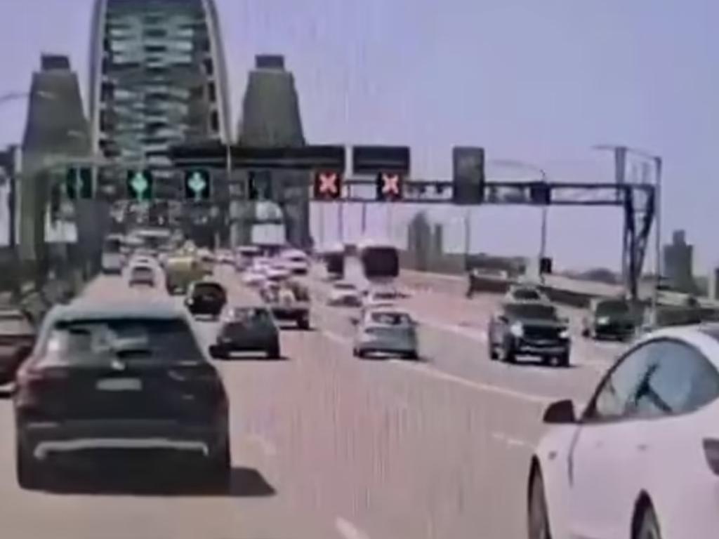 The blue sedan travelling in the outside lane could be seen drifting into the oncoming traffic.