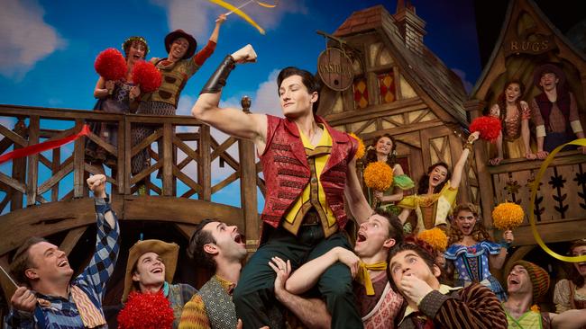 Gaston – played by Rubin Matters and pictured with the ensemble of Disney's Beauty and the Beast the Musical, including as Gaston and Nick Cox as Le Fou – is athletically gifted in the musical. Picture: Eugene Hyland