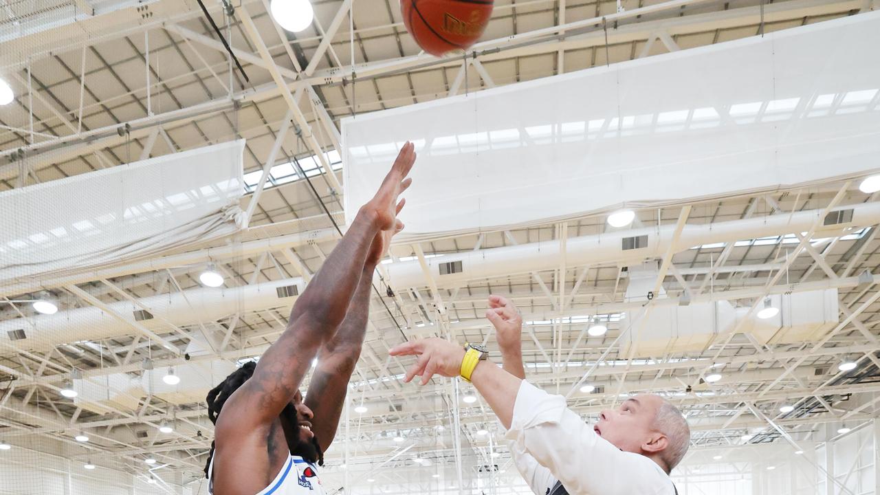 Mayor Tom Tate with Brisbane Bullets star Casey Prather at the Carrara indoor stadium. Picture: Glenn Hampson.