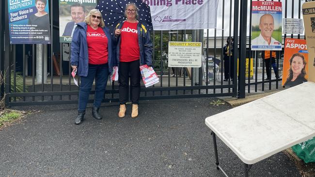 Labor Party supporters Deanna McDonald and Susan Jenvey at the treacherously steep entrance path to the school. Picture: Chris Knight