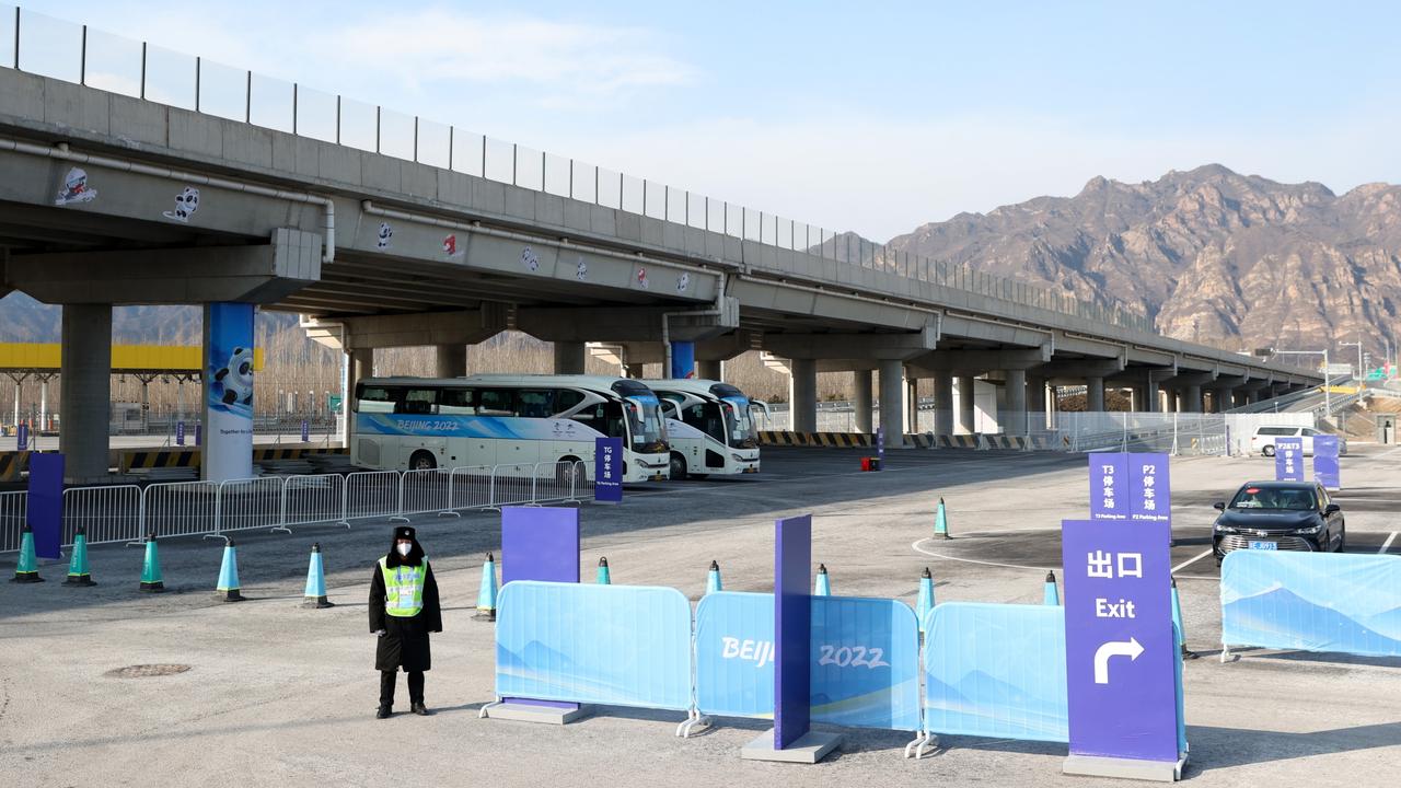 Guards patrol the grounds at the The Yanqing National Sliding Centre. (Photo by Alex Pantling/Getty Images)