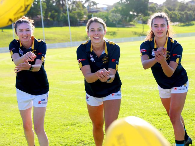 Tarrant (right) with fellow Eagles players Bre Dannellan and Jordan Roughan. Picture: Angelo Velardo